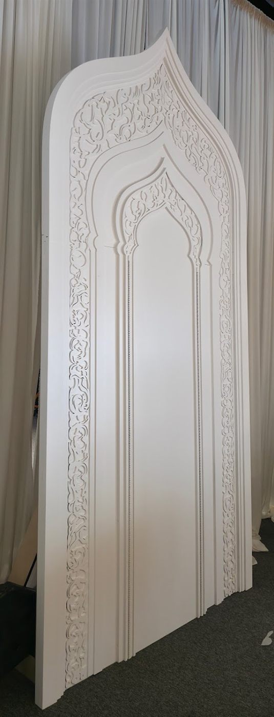Custom laser-cut ornate arched panel by Laser Precision