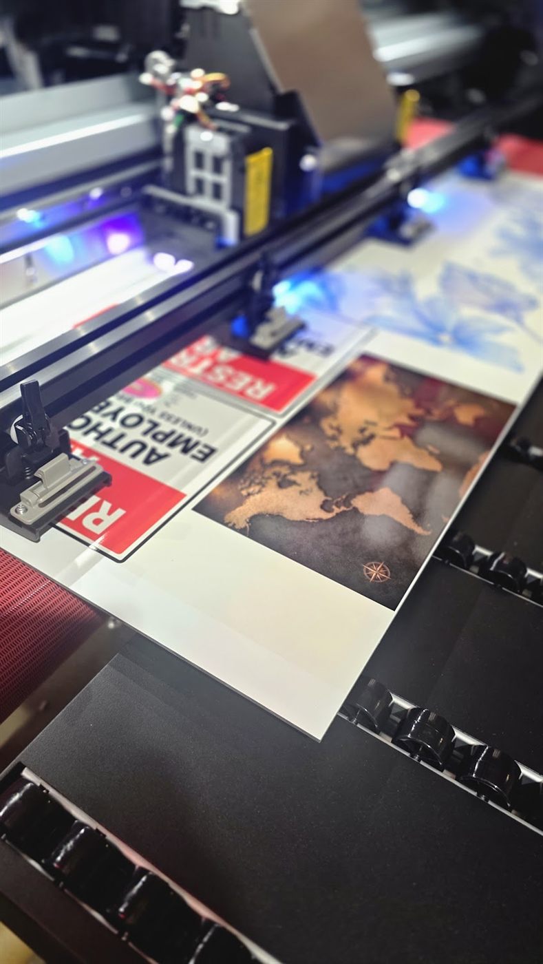 Custom graphics printing on the flatbed at Laser Precision