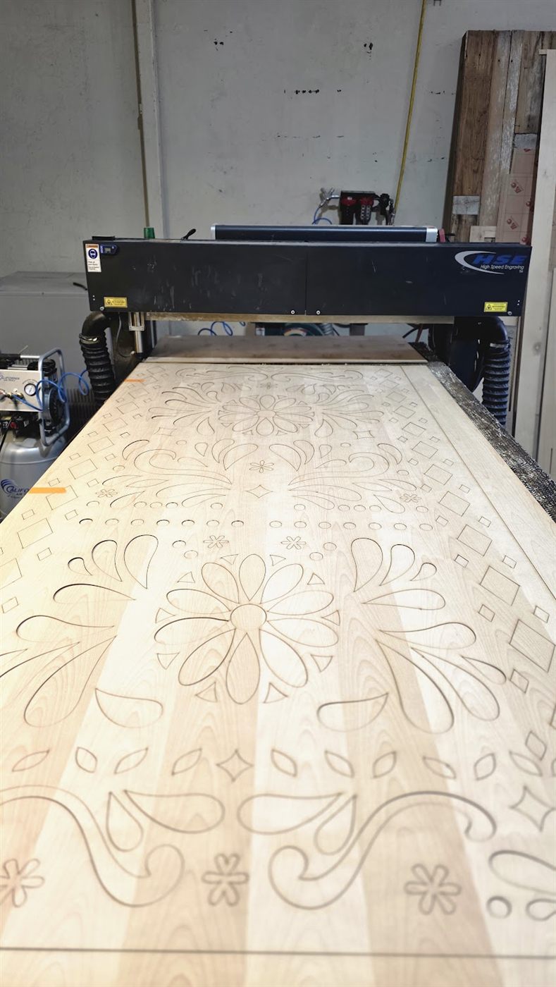 Custom floral laser-cut wood panel by Laser Precision