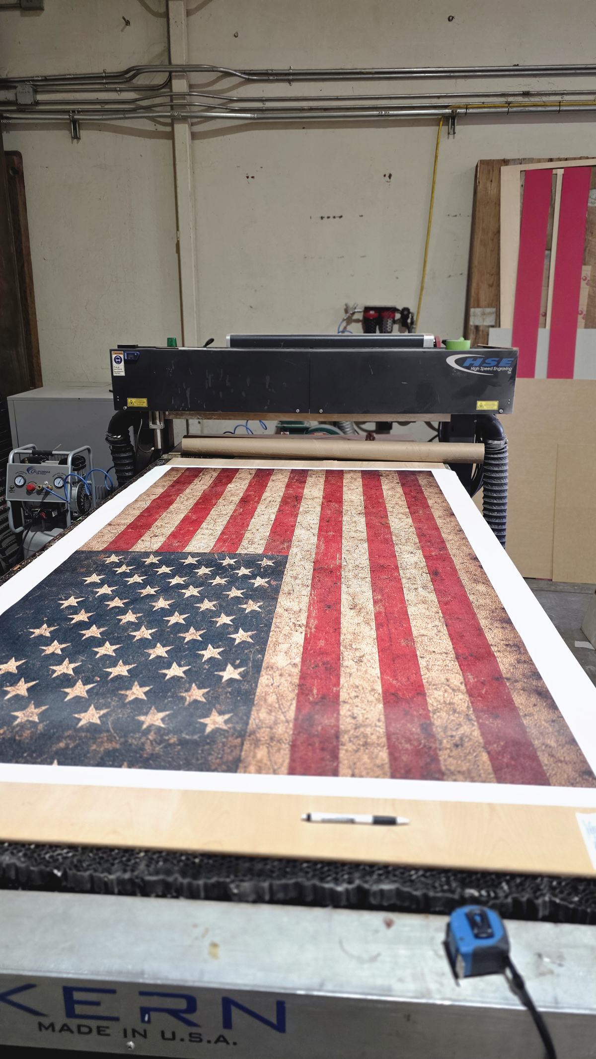 Vintage American flag being printed on the Kern laser at Laser Precision